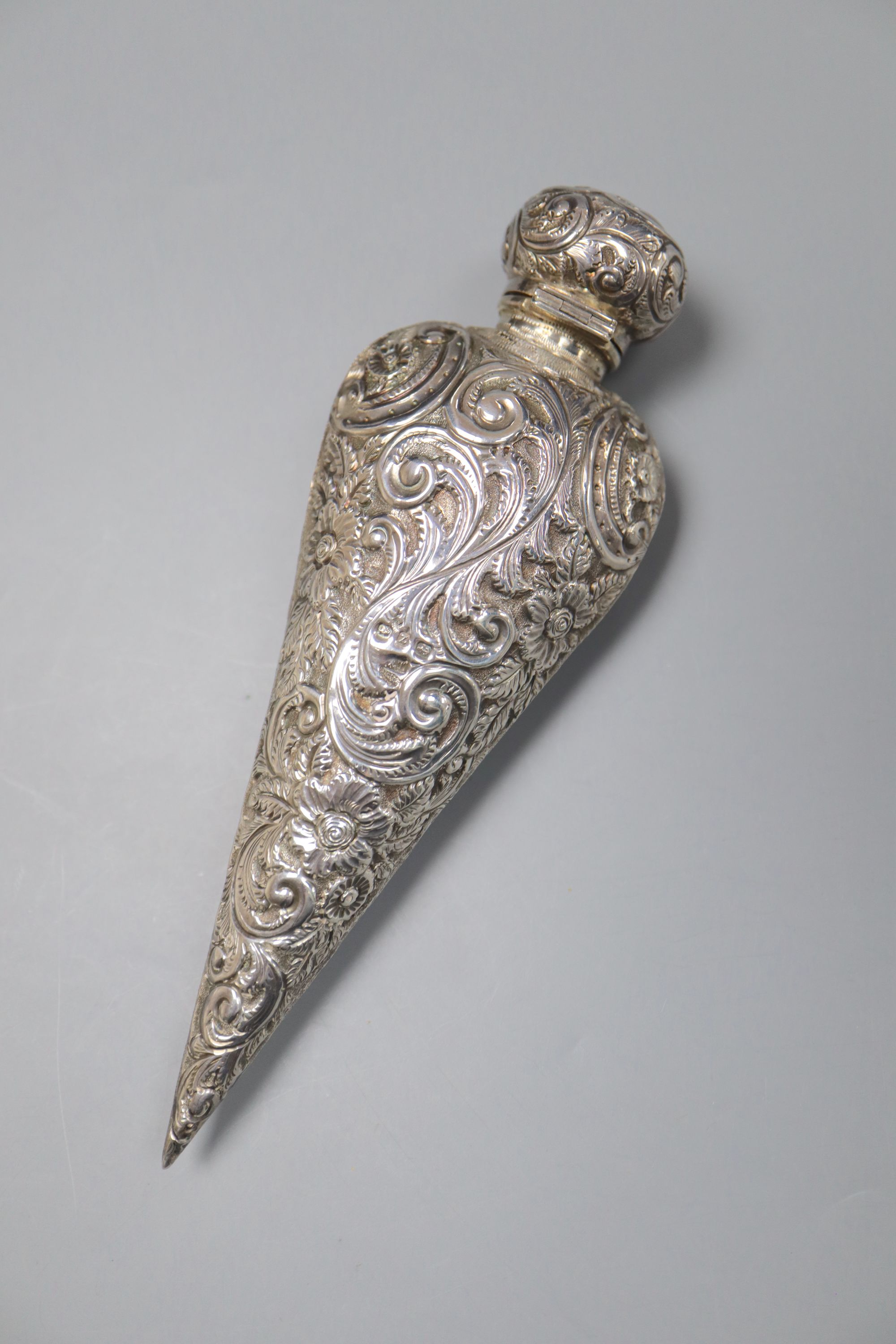 A Victorian silver mounted teardrop shaped scent bottle, Hilliard & Thomason?, Birmingham, 1899, 15.8cm.